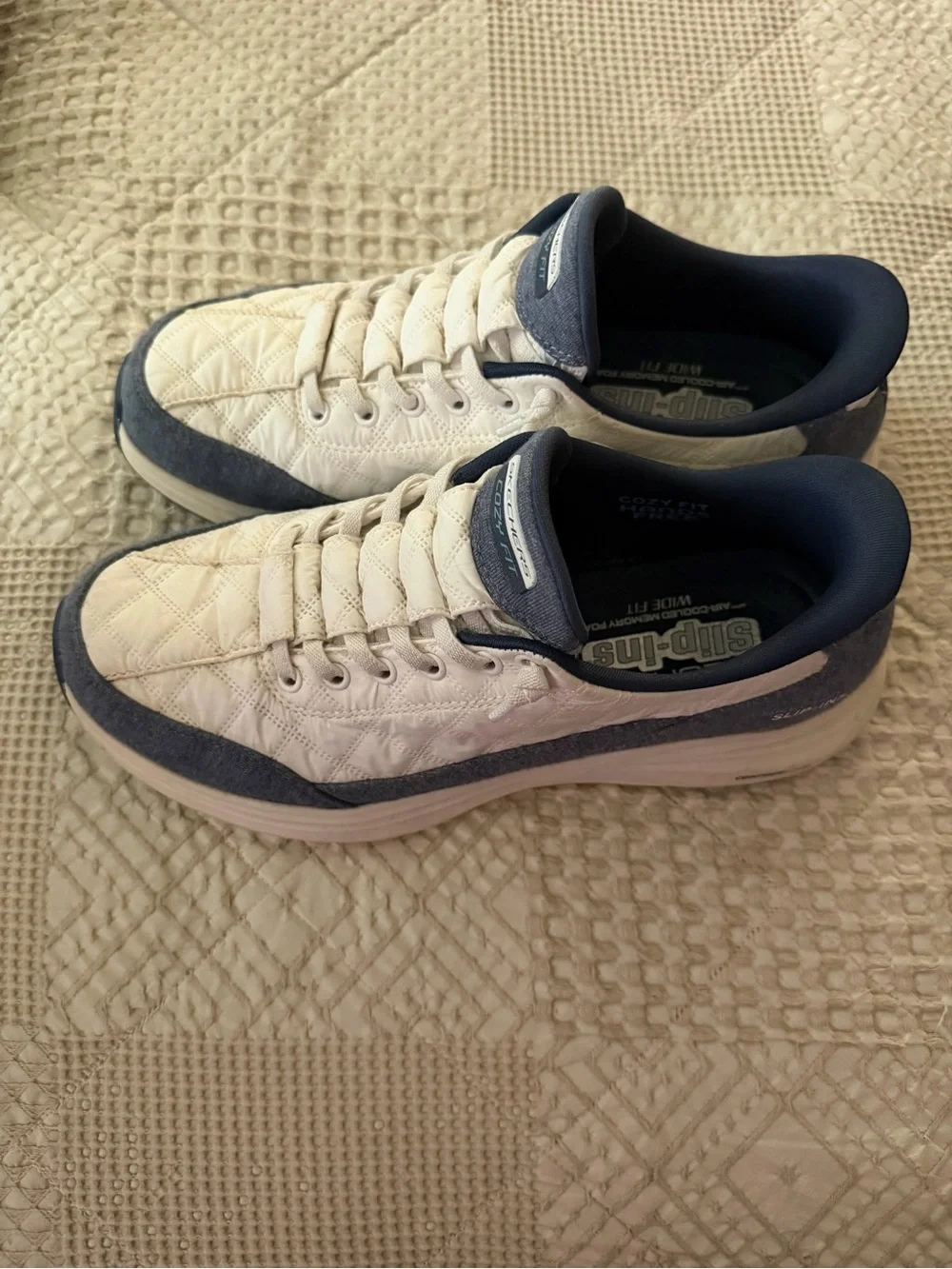 Skechers Women’s Cozy Fit Quilted Sneakers in White and Navy